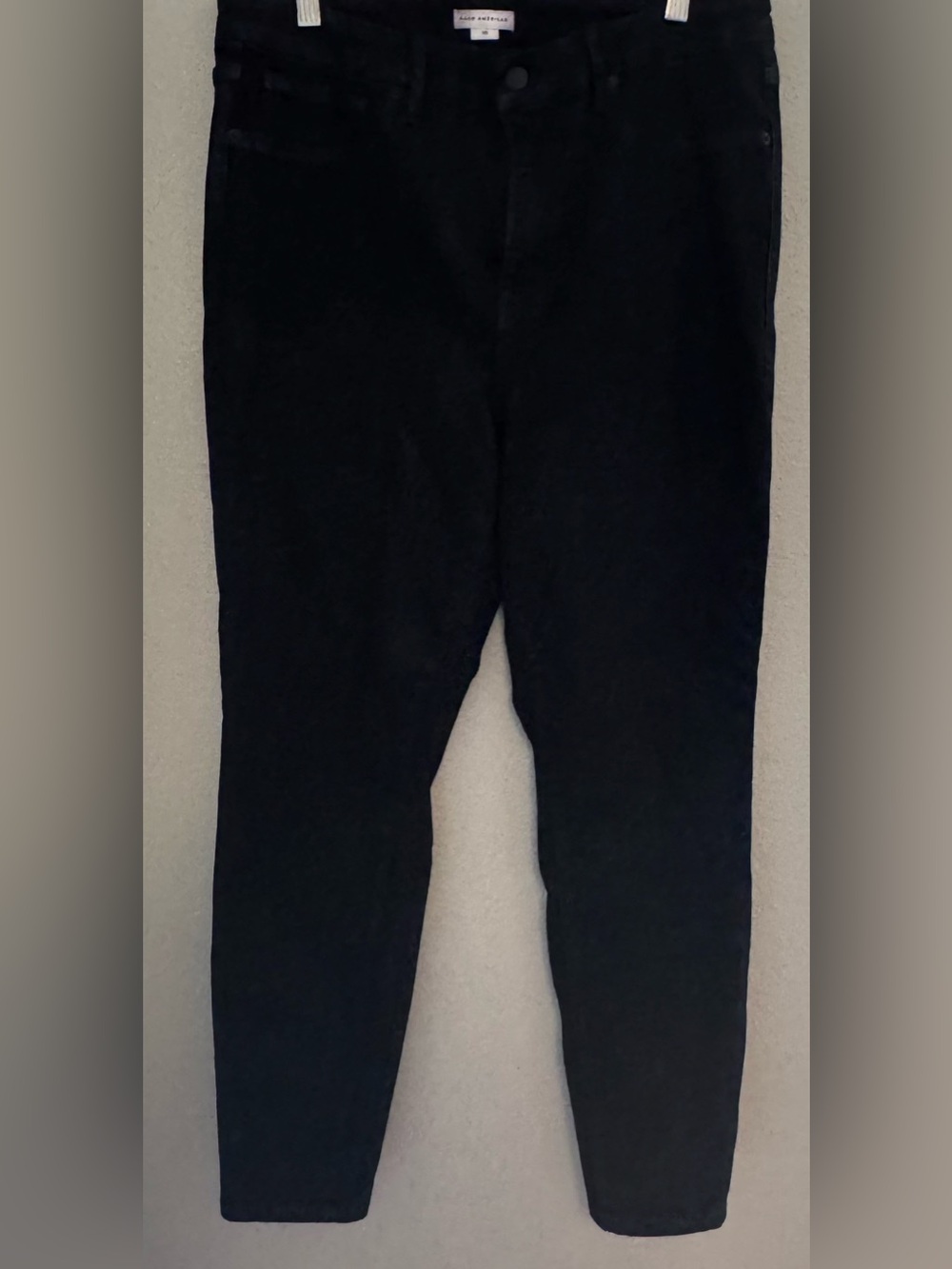 Good American Straight Leg Jeans in Black with a Slight Shimmer